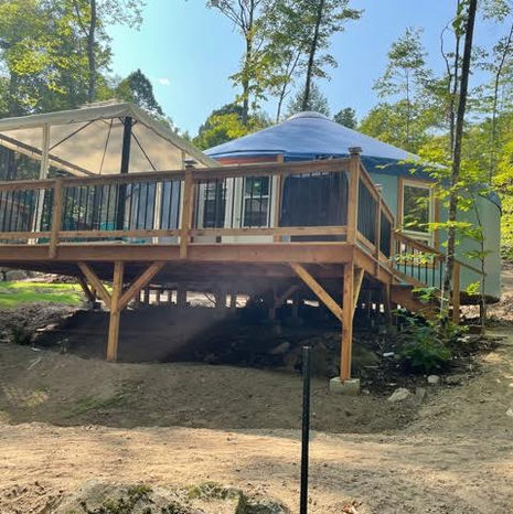 blue yurt with balcony