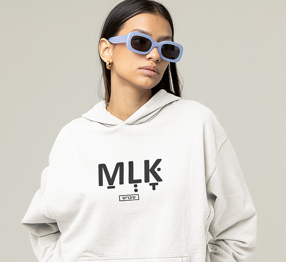 oversized-hoodie-mockup-of-a-modern-woman-posing-at-a-studio-m26238.png
