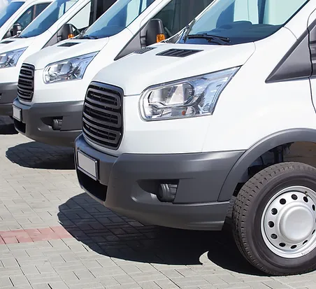 White Minibuses.webp