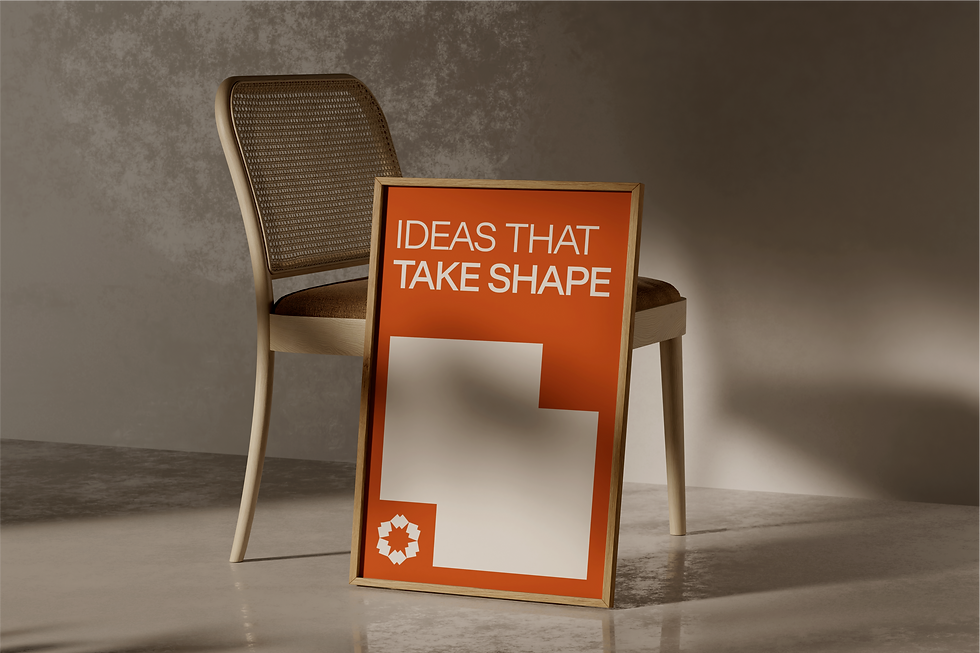 Kennith Infraventures motivational poster reading ‘Ideas That Take Shape’ in orange and white, architectural branding collateral.