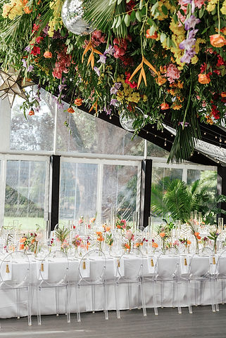 NOMA tented wedding with tropical flowers and a ceiling install Leaf + Petal NOLA