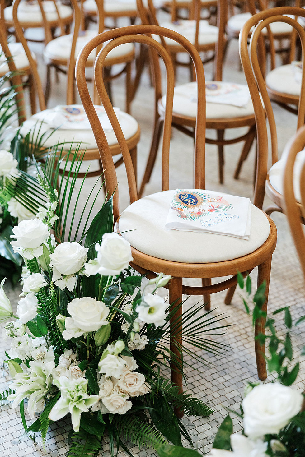 white tropical aisle markers in the great hall of NOMA for a wedding flowers by Leaf + Petal