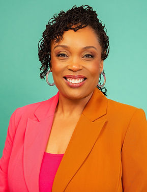 Renai 2-color block blazer smiling headshot.jpg