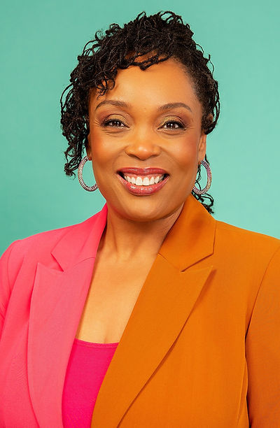 Renai 2-color block blazer smiling headshot.jpg