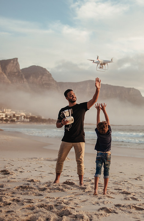 Father and Son Flying a Drone