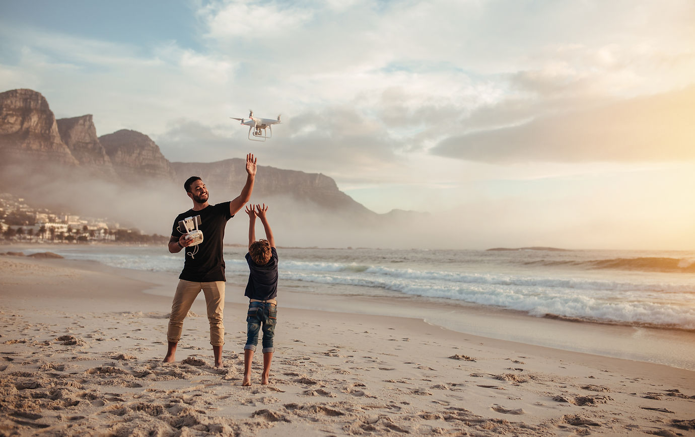 Father and Son Flying a Drone