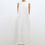 Thumbnail: Front view of sleeveless hourglass white  dress with soft lines and subtle volume at the hem