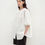 Thumbnail: white angled view puff sleeve top styled with black mini skirt