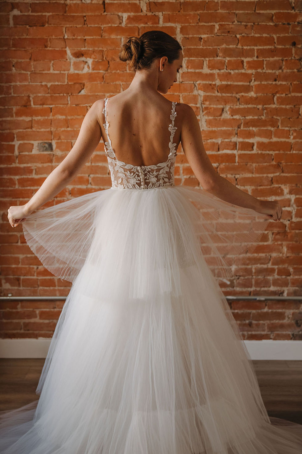 Thumbnail: Elsie | S242112
Gown Info
Delight in timeless elegance with this enchanting gown, crafted from delicate layers of ivory and nude mesh adorned with intricate embroidery. Featuring a flattering sweetheart neckline and delicate straps embellished with flower appliques, it exudes grace and sophistication. The mermaid skirt gracefully accentuates your figure, while the detachable pleated tulle train adds a touch of versatility to your look. Complete with understated beads and a sleek silhouette, this gown promises to make you feel truly radiant on your special day

Material
Tulle

Color & Size
Shown in Ivory/Ivory

Available Sizes: 2 - 28 / 14W - 32W Size Chart