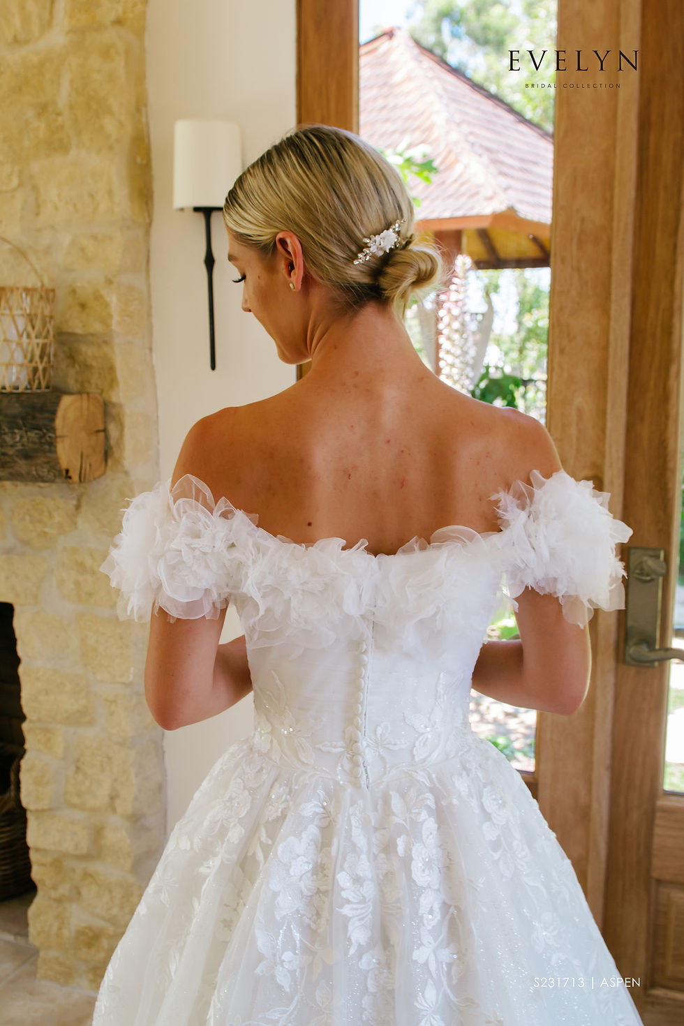 Thumbnail: Aspen | S231713
Gown Info
Off the shoulder ruffle sleeves lend romance and style to this tulle and lace ball gown. Aspen features a pleated tulle bodice and cascading lace appliques on a sparkle tulle skirt. A chapel length train completes this romantic dress.

Material
Tulle/Lace

 

Color & Size
Ivory