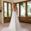 Thumbnail: Bella | N231723
Gown Info
Create the wedding day look of your dreams with this lace and tulle A-Line gown. Lace applique cap sleeves, a stunning V neckline, and an illusion scoop back neckline with lace applique embellishment makes Bella (and the bride wearing it!) the belle of the ball. The beaded applique bodice flows effortlessly into a court length train.

Material
Lace/Tulle

Color & Size
Ivory/Nude

Sizes available - 2-28 / 14W-32W