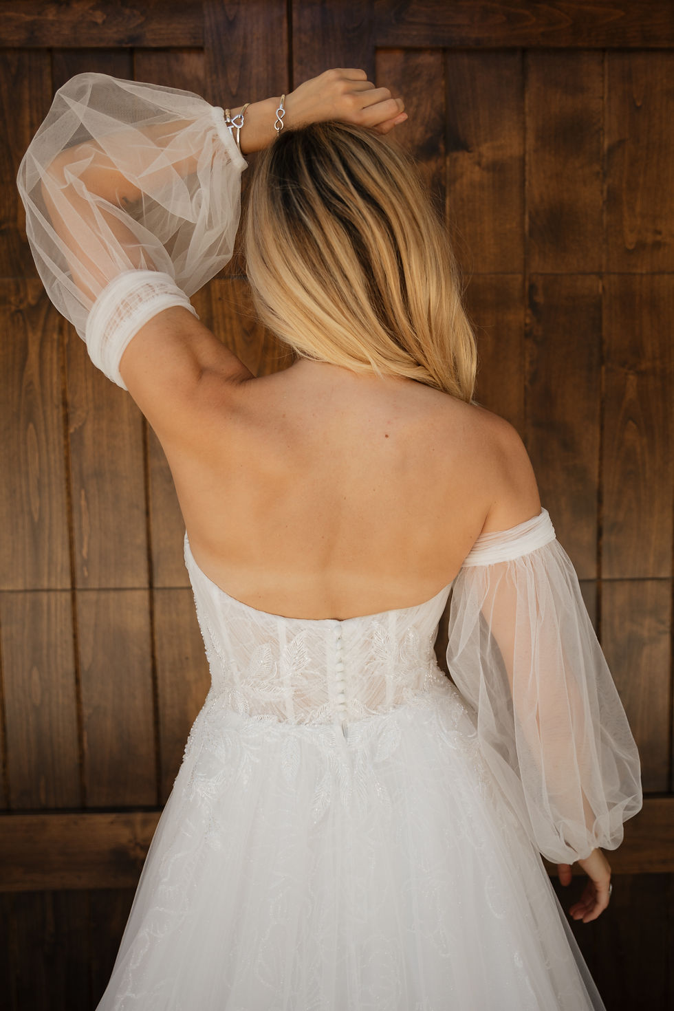 Thumbnail: Molly | S25511
Gown Info
Available with or without sleeves

Step into a vision of timeless elegance with this stunning gown, where layers of ethereal tulle and shimmering glitter tulle delicately drape over a luxurious bodysuit. The sweetheart neckline gracefully frames the shoulders, exuding understated allure and classic charm. Detachable Sleeves offer versatility, allowing you to seamlessly transition your look from ceremony to celebration with ease. Flowing into an A-line skirt, this gown flatters every silhouette with its graceful movement and timeless silhouette, designed for the bride who desires both grace and allure, promising to enchant and captivate, ensuring you feel radiant and unforgettable on your special day.

Material
Lace/Tulle

Color & Size
Available in Ivory/Ivory

Available Sizes: 2 - 28 / 14W - 32W Size Chart