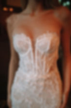 Thumbnail: Alexandra | S232817
Gown Info
The ethereal tulle gown features a romantic sweetheart neckline combined with a sweetheart with illusion deep V neckline, and a stunning fishtail skirt that trails behind. The bodice is delicately adorned with intricate diagonal stripes on the chest, with sheer panels and flat lace that cascade all the way down to the skirt, complete with delicate beading for a touch of glamour. The skirt features a playful wavy triangular tulle accent that creates a whimsical, airy feel as you move. A striped lace lining provides a soft, romantic touch to this dreamy dress.

Material
Tulle/Lace

Color & Size
Shown in Ivory/Nude

Also available in Ivory/Ivory

Available Sizes: 2 - 28 / 14W - 32W