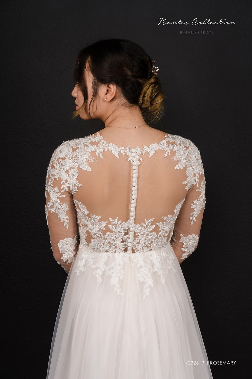 Thumbnail: ROSEMARY | N222619
Gown Info
We adore this long-sleeve lace and tulle ballgown. The back of this gown is ultra-romantic as it features an illusion back neckline, dainty covered buttons, and a show stopping chapel length train. A soft V-neckline and sheer long sleeves add to the dreamy feel of this dress. 

Material
Lace/Tulle

Color & Size
Ivory/Pink (Shown)

Ivory

 

Sizes available - 2-28  / 14W-32W