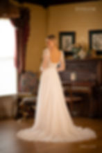 Thumbnail: Layne | S232815
Gown Info
Available with or without sleeves

Get ready to stun on your big day with our breathtaking tullesquare neckline wedding dress. The small flared skirt and intricate lace ruffles create a playful yet sophisticated look, while the diagonal stripes on the upper body and chest add a touch of contemporary flair. Delicate beads and shimmering sequins embellish the lace ruffles, and the 3D embroidered flowers on the upper body are simply breathtaking. The back of the dress features a button closure and a long-sleeved tulle top with lace ruffles and sequins on the sleeves. The button closures at the cuffs and back of the upper body ensure a comfortable and secure fit throughout your special day. With this enchanting and romantic wedding dress, you'll feel like the most beautiful and radiant bride.

Material
Tulle/Lace

Color & Size
Shown in Ivory/Pearl

Also available in Ivory/Ivory

Available Sizes: 2 - 28 / 14W - 32W