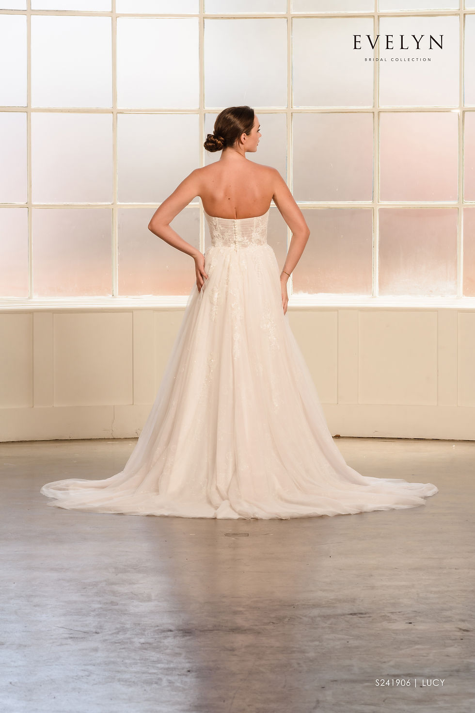 Thumbnail: Lucy | S241906
Gown Info
Discover pure enchantment with this captivating wedding dress. The sweetheart neckline and wide tulle skirt create a romantic silhouette. Delicate lace appliques, 3D embellishments, and shimmering beadwork add depth and allure. With a convenient zipper and button closure, this dress is both stunning and easy to wear. Embrace the magic of your special day in this exquisite gown.

Material
Tulle

Color & Size
Shown in Ivory/Light Pink

Also available in Ivory/Ivory

Available Sizes: 2 - 28 / 14W - 32W Size Chart