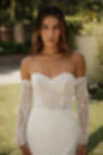 Thumbnail: Tiana | S25502
Gown Info
Available with or without train

Indulge in romance and allure with this exquisite gown, where delicate fabric and soft pink tulle intertwine effortlesslt with beaded lace. The sweetheart neckline and detachable sleeves evoke timeless elegance, while the sheath skirt gracefully enhances curves. Featuring a detachable train, this gown offers versatility and enchantment, ensuring every bride feels irresistibly romantic and confidently beautiful on her special day.

Material
Tulle/Beading

Color & Size
Shown in Ivory/Light Pink

Also available in Ivory/Ivory

Available Sizes: 2 - 28 / 14W - 32W Size Chart



