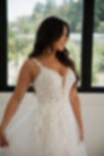 Thumbnail: Cassandra | S25515
Gown Info
Step into refined elegance with this stunning gown, featuring tulle layered delicately over organza and a soft lining, with a bodysuit inside for luxurious comfort. Adorned with exquisite 3D embroidered lace, this gown is a testament to timeless craftsmanship and sophistication. The deep V-neckline adds a daring yet graceful touch, complementing the neckline beautifully. Flowing into an A-line Skirt, this silhouette offers a blend of romance and sophistication, perfect for the bride seeking a classic yet contemporary bridal look. This gown is designed to captivate hearts and create cherished memories on your special day.

Material
Lace/Tulle/Organza

Color & Size
Shown in Ivory/Light Champagne

Also available in Ivory/Ivory

Available Sizes: 2 - 28 / 14W - 32W Size Chart