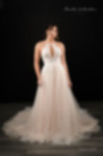 Thumbnail: DAHLIA | N222612
Gown Info
A modern take on a classical silhouette! A stunning halter top with a keyhole and a beaded neckline are the focal point of the Dahlia Dress. However, no less gorgeous than the halter top are the sequined lace appliques that adorn the top of the dress and the beautiful chapel length train.

Material
Tulle/Lace

Color & Size
Ivory/Pink (Shown)

Ivory

 

Sizes available - 2-28  / 14W-32W
