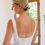 Thumbnail: Josie | N231720
Gown Info
This lace and tulle sleeveless ball gown is pleasing to the eye with its soft square neckline. The lace pleat over overlace and chapel length train makes Josie a classic and elegant choice for all brides to feel beautiful in on their big day.

Material
Lace/Tulle

Color & Size
Ivory/Nude

Sizes available - 2-28 / 14W-32W