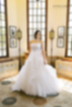 Thumbnail: LORELEI | S221506
Gown Info
Gorgeous tulle and lace ball gown with asymmetrical faux peplum skirt. The bodice features a straight neckline with a gathering of soft tulle and delicate dandelion lace appliques. The ball gown style tulle skirt flows to a cathedral length train with peeping lace appliques throughout.

Material
Lace

Tulle

 

Color & Size
Ivory/Light Champagne (Shown)

Ivory/Ivory

Sizes available in 2-28  / 14W-32W