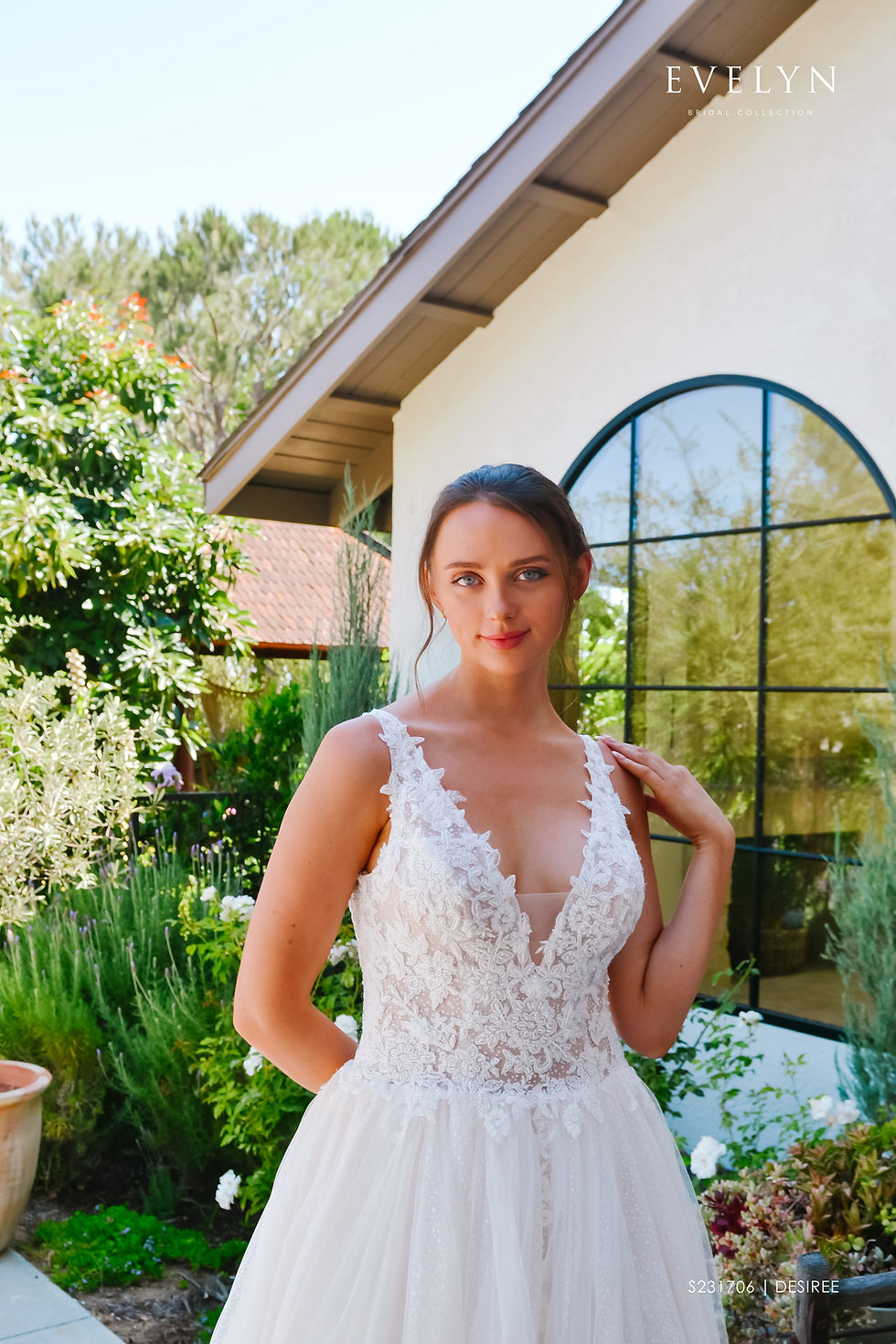 Thumbnail: Desiree | S231706
Gown Info
This lace and tulle ball gown with a deep V neckline is sweet and romantic! Lace applique straps effortlessly flow into lower appliques on a chapel length train. With its plunging V back neckline and sparkle tulle, Desiree was made for the bride with a classic and dreamy style in mind.

Material
Lace/Tulle

Color & Size
Ivory/Nude

Ivory/Ivory

Sizes available - 2-28 / 14W-32W