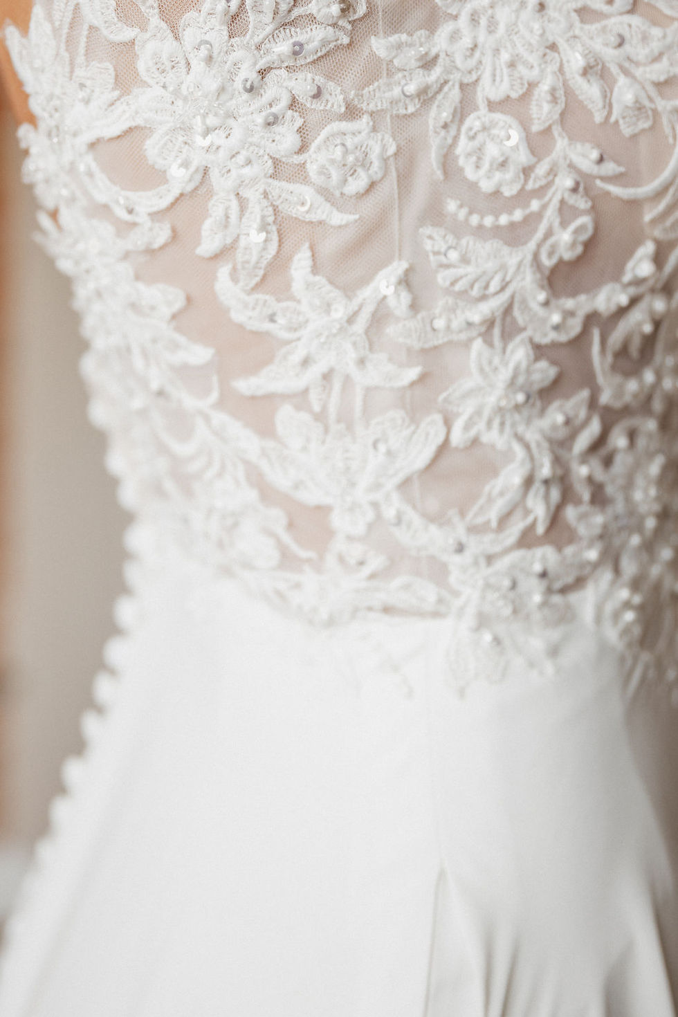 Thumbnail: Posie | N242122
Gown Info
Embrace enchanting elegance in this gown, featuring a bodice of tulle adorned with delicate appliqués and beads, while the lower chiffon skirt boasts appliqués.  The V-neckline adds a touch of timeless charm with 3D flower straps, and the A-line skirt completes the look with grace and sophistication. Buttons from the back waist all the way down to the train add a classic touch, while carefully finished place appliques all around the train add sophistication. This gown promises to make your entrance truly unforgettable on your special day.

Material
Tulle

Color & Size
Shown in Ivory/Nude

Also available in Ivory/Ivory

Available Sizes: 2 - 28 / 14W - 32W Size Chart