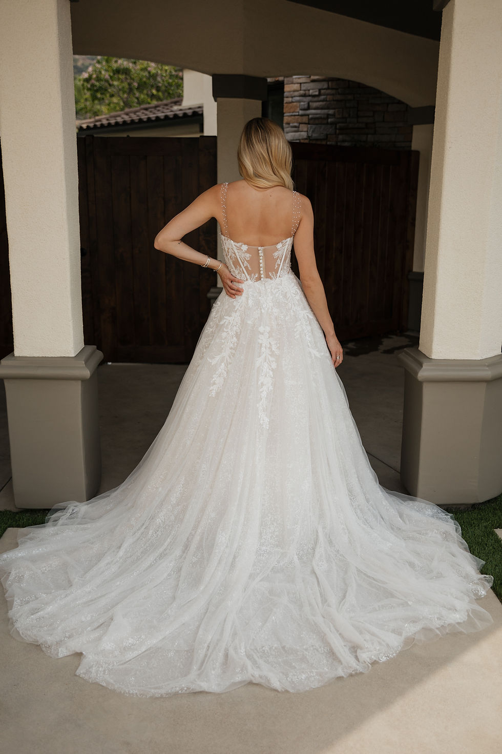 Thumbnail: Marleigh | S25508
Gown Info
Step into sheer elegance with our captivating ball gown, where shimmering glitter tulle and ethereal organza intertwine over a luxurious lining featuring a bodysuit for unparalleled comfort. The scoop neckline gracefully frames the shoulders with timeless charm, offering a touch of understated allure. Designed to command attention, the voluminous ball gown silhouette creates a regal presence, ensuring you feel like royalty on your special day.

Material
Organza/Tulle

Color & Size
Shown in Ivory/Champagne

Also available in Ivory/Ivory

Available Sizes: 2 - 28 / 14W - 32W Size Chart