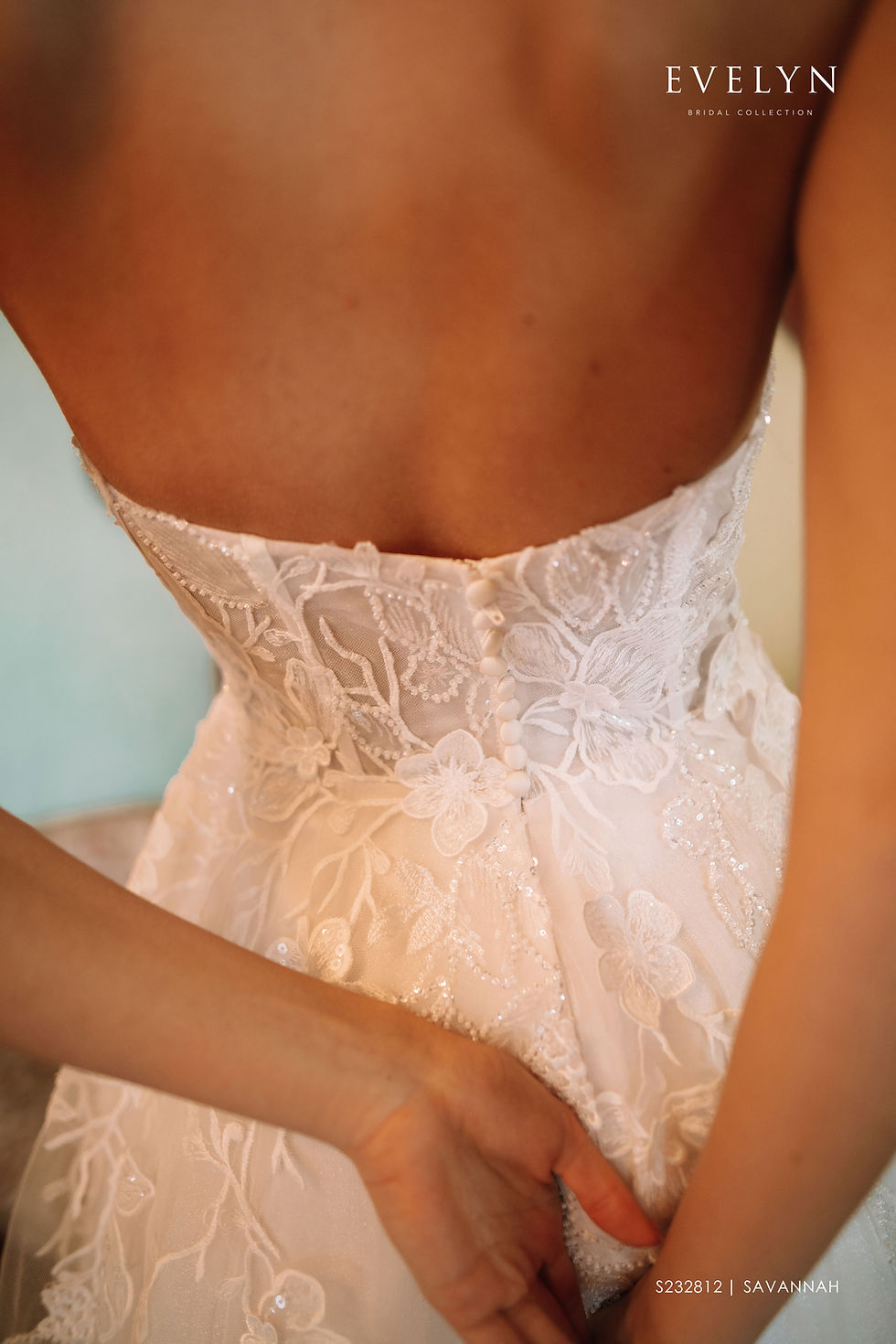 Thumbnail: Savannah | S232812
Gown Info
Step into a world of enchantment with this breathtaking wedding dress. The delicate tulle fabric is light and graceful, draping elegantly over your curves. The sweetheart neckline is alluring, highlighting your natural beauty, while the diagonal stripes on the cups and upper body add a playful touch. Delicate flat lace, 3D embroidered flowers, and shimmering beads adorn the upper body and skirt, creating a magical atmosphere around you. The small flared skirt adds a touch of charm and whimsy, perfect for twirling on the dance floor. With a hook-and-eye closure at the back, this dress will fit you like a glove, accentuating your every move. You'll captivate your audience as you walk down the aisle in this stunning creation.

Material
Tulle/Lace

Color & Size
Shown in Ivory/Light Pink

Available Sizes: 2 - 28 / 14W - 32W