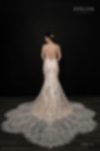 Thumbnail: A modern lace wedding gown. 

IVY | S222602
Gown Info
A carefree, modern dress with gorgeous lace detailing perfect for a bride that doesn’t want a traditional gown! The bodice features a deep V neckline complete with intricate lace and sheer designs. These details continue into the fitted skirt. The most dramatic part of the dress is the lace and uniquely scalloped train. 

Material
Lace Tulle

Color & Size
Ivory/Champagne (Shown)

Ivory

 

Sizes available - 2-28  / 14W-32W