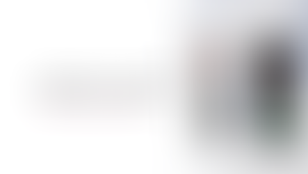 A set of stop lights, one showing red one showing green.