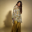 Thumbnail: Olive shoulder printed embellished asymmetric top and flare pants in satin silk perfect for Mehendi