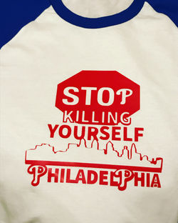 STOP THE VIOLENCE BASEBALL TEE $25