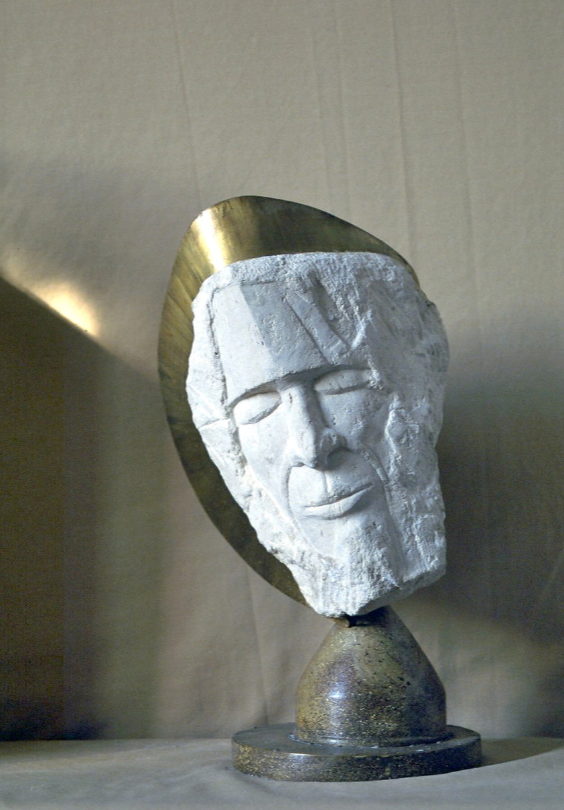 sculpture en pierre et cuivre visage