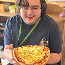 Participant with a pizza