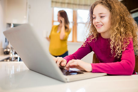 girl-using-laptop-kitchen.jpg
