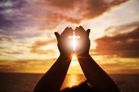 praying-hands-cross-iStock-881959374-arkira.WEB_.jpg