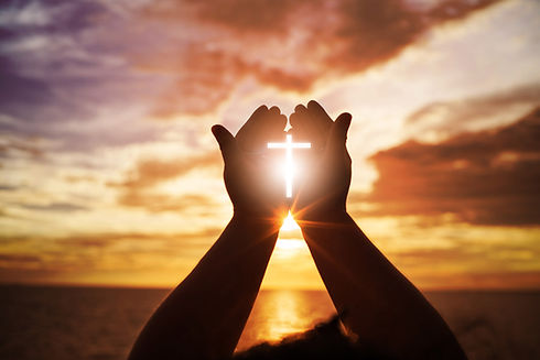praying-hands-cross-iStock-881959374-arkira.WEB_.jpg