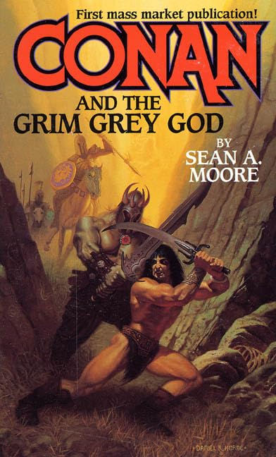 The cover to Conan and the Grim Grey God by Sean A. Moore. Conan is attacked by an undead warrior from behind.