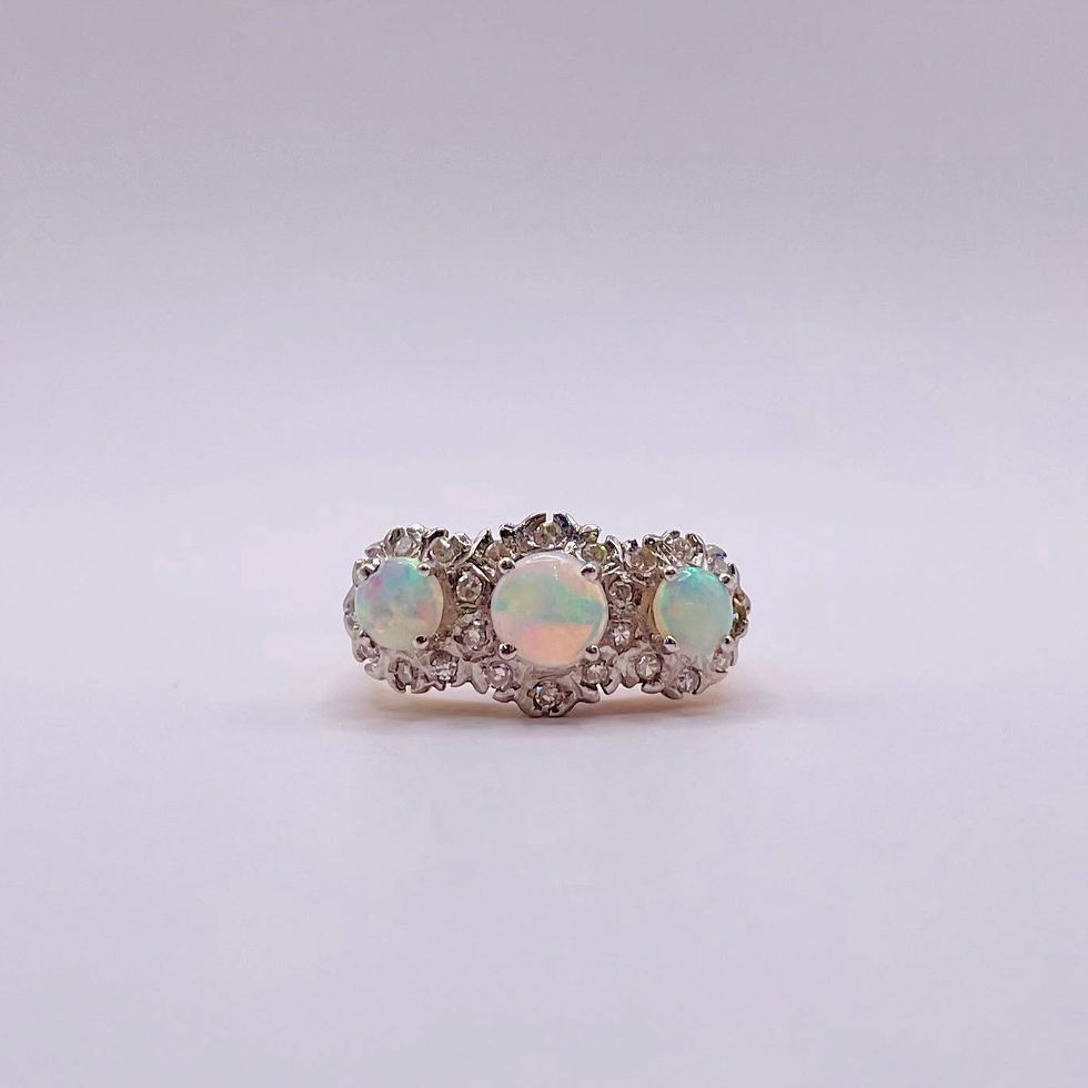 Thumbnail: Opal Cabochon Trilogy and Diamond Surround Ring