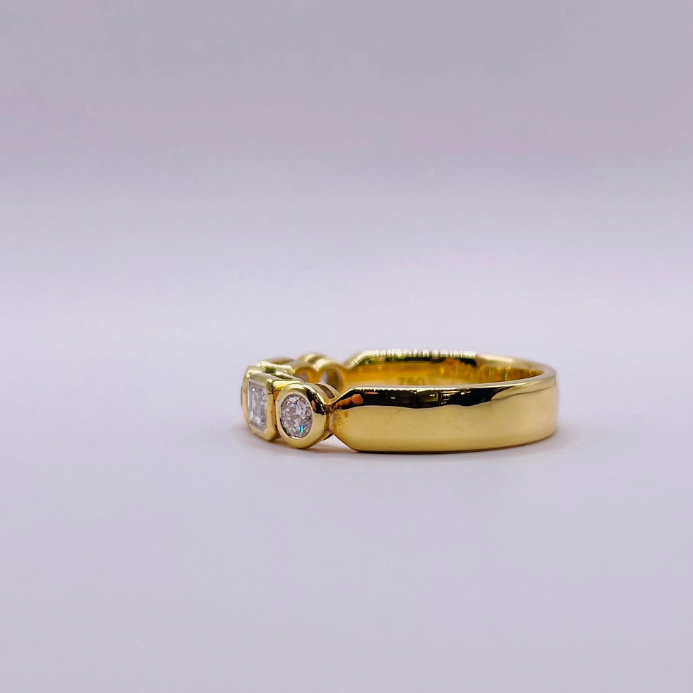 Thumbnail: Wide Bezel Set Baguette and Round Diamond Eternity Ring