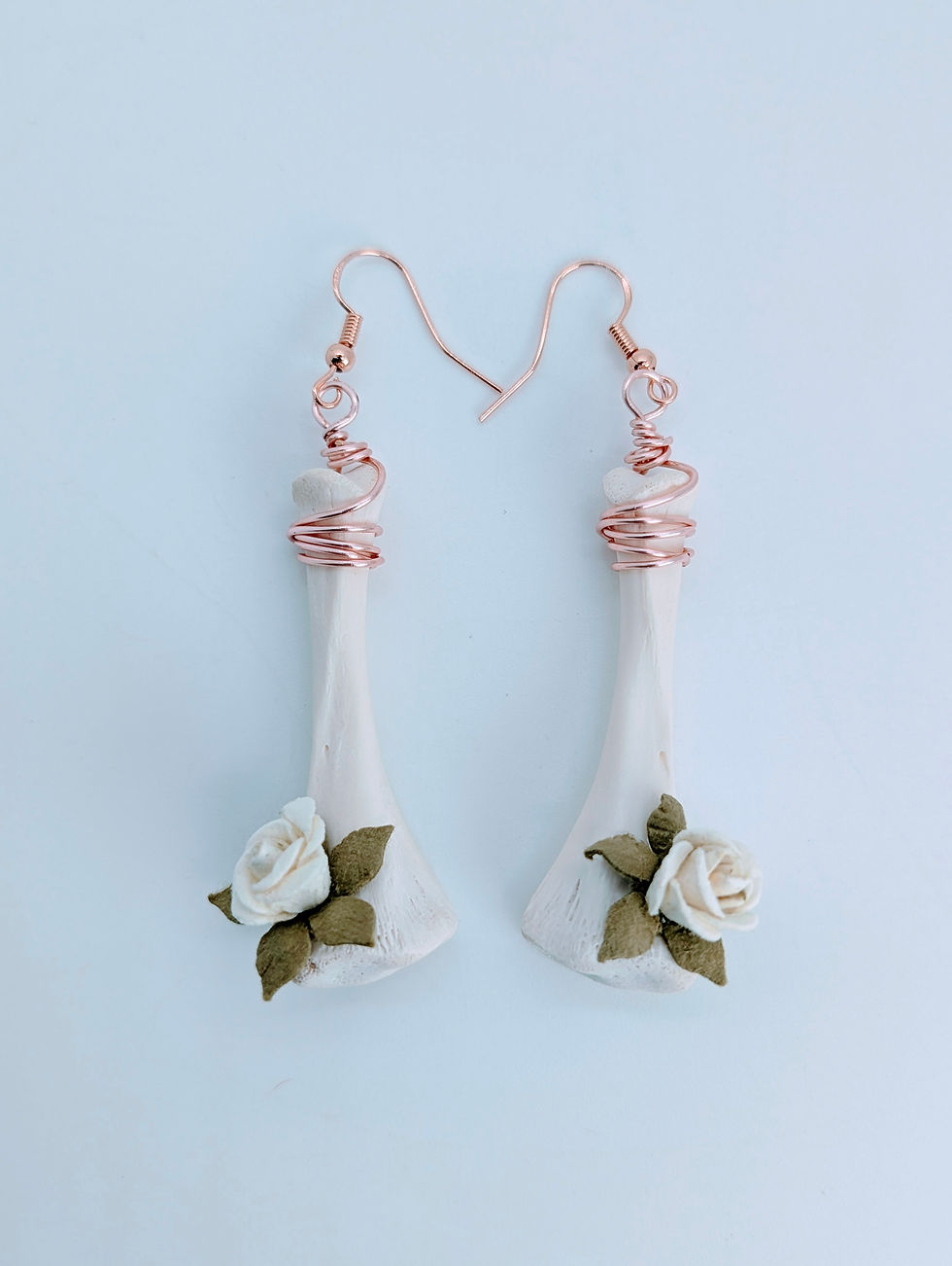 Tapered White Softshell Turtle Tibia Earrings with Rose Gold Wire Wrap and White Flowers.