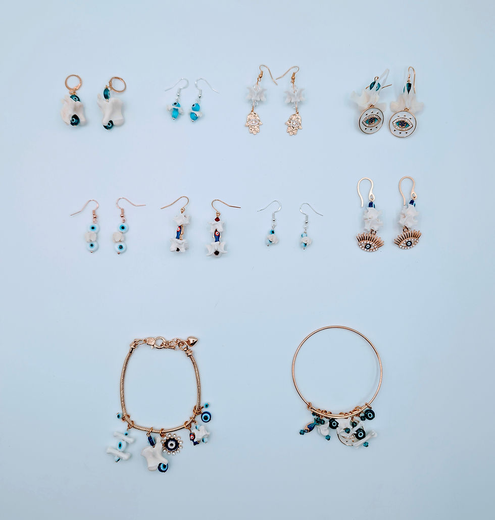 Thumbnail: Burmese Python Vertebrae Evil Eye Earrings | Bone Boutique
