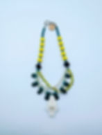 Handcrafted 19-inch unisex necklace featuring a white Gaff-topsail catfish skull pendant, green Malaysia jade teardrops, and