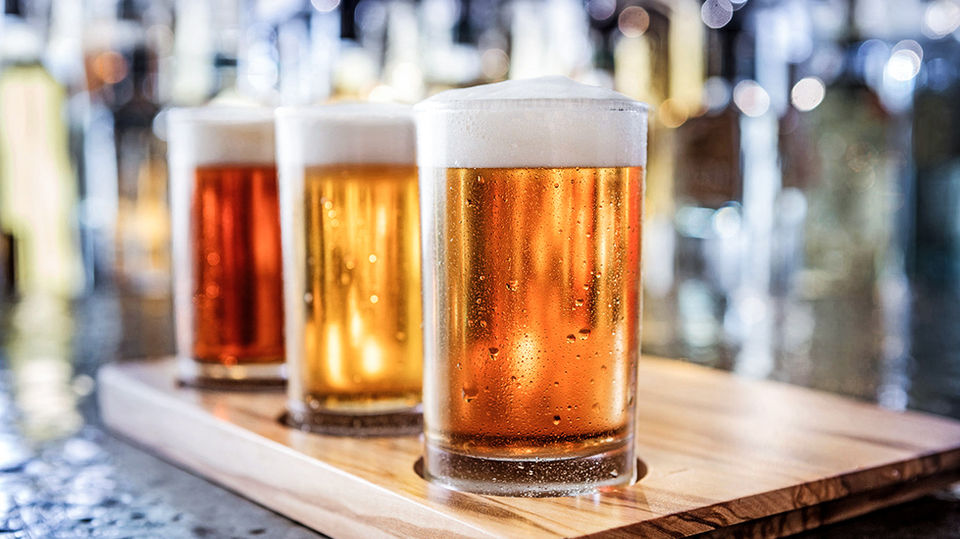 Flight of beers in bar setting, Dallas Beverage Photography