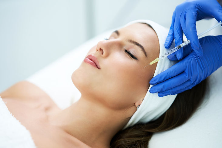 beautiful-young-woman-getting-acid-face-treatment-beauty-salon.jpg
