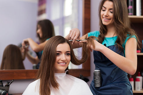 beautiful-woman-has-cutting-hair-hairdresser.jpg