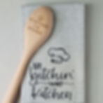 wooden spoon and tea towel with name on both