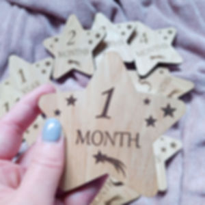 Baby monthly milestone marker