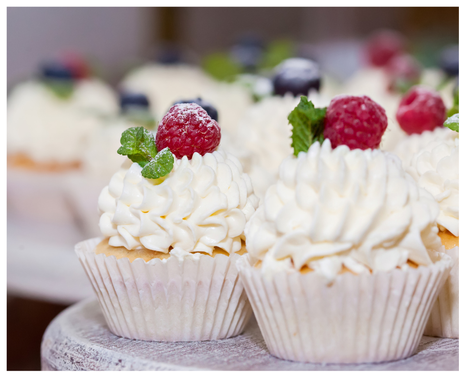 White cup cakes on tray